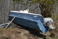 Spring boat repair on the shore.