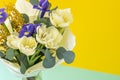 Spring bouquet of flowers. Irises, tulips, mimosa and eucalyptus. Yellow and blue flower. Bud close-up. Floral Royalty Free Stock Photo