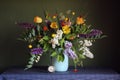 Spring bouquet with garden flowers in a jug Royalty Free Stock Photo