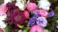 Spring bouquet of mixed colorful flowers. Flowers bouquet including chrysanthemum, lisianthus, pink roses, white roses Royalty Free Stock Photo