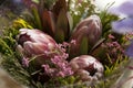 Spring bouquet of red protea, waxflower a for a special wedding