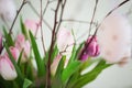 Spring bouquet of white and purple tulips decorated with Easter decorations Royalty Free Stock Photo