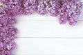 Spring branch lilac flowers on  wooden table Royalty Free Stock Photo
