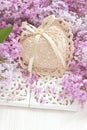 Spring branch lilac flowers on  wooden table Royalty Free Stock Photo