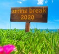Spring break 2020 written on a wooden sign Royalty Free Stock Photo