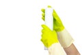 Spring cleaning concept. Top view of hand in yellow rubber gloves holding Sprayed air freshener. The concept of cleaning service. Royalty Free Stock Photo