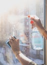 Spring cleaning - cleaning windows. Women`s hands wash the window, cleaning Royalty Free Stock Photo