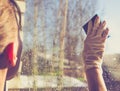 Spring cleaning - cleaning windows. Women`s hands wash the window, cleaning Royalty Free Stock Photo