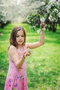 Spring closeup outdoor portrait of adorable 11 years old preteen kid girl Royalty Free Stock Photo