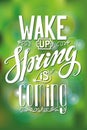 Spring is coming.Lettering.Green blurred background