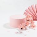 Spring cylinder podium mockup decorated of semicircle asian fans, twig pink sakura flowers, petals on white wood background, japan