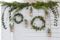 Spring decor. Easter decor. Photozone. A wreath of leaves on a wooden white background.