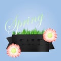 Spring discounts banner: a black flag with the inscription and grass