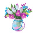 Spring Easter bouquet with white tulips and delicate multicolored flowers in a transparent vase