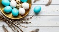 Spring Easter Flat Lay with Blue and Speckled Eggs, Pussy Willow, and Feathers Royalty Free Stock Photo
