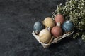 Spring easter minimal background rustic style composition - organic naturally dyed easter eggs Royalty Free Stock Photo