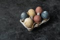 Spring easter minimal background rustic style composition - organic naturally dyed easter eggs Royalty Free Stock Photo