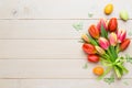 Spring easter tulips in bucket on white vintage background. Royalty Free Stock Photo