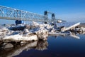 Spring evening in Arkhangelsk. Ice drift on the Severnaya Dvina river. The world`s northernmost drawbridge Royalty Free Stock Photo