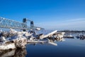 Spring evening in Arkhangelsk. Ice drift on the Severnaya Dvina river. The world`s northernmost drawbridge