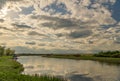Spring evening on the river on a day with partly cloudy Royalty Free Stock Photo