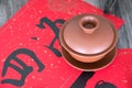 Spring Festival couplets and a bowl of tea.The Chinese character in the picture means: `worldwide` Royalty Free Stock Photo