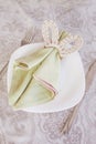 Spring festive linen napkins and cute bunny decor on linen tablecloth. Easter time. Cozy home Royalty Free Stock Photo