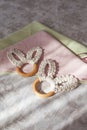 Spring festive linen napkins and cute bunny decor on linen tablecloth. Easter time. Cozy home Royalty Free Stock Photo