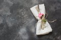 Spring festive table setting with cutlery and lilac flower on black stone table. Copy space. Flat lay. Royalty Free Stock Photo