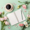 Spring flat lay with blank notebook surrounded by pink tulips and yellow daffodils Royalty Free Stock Photo