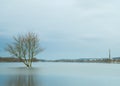 Spring flood in Kaunas, confluence of the Nemunas and the Neris ND1000 Flooded park, trees, city infrastructure. Water level, rive Royalty Free Stock Photo