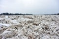 Spring flood threat. The ice jam on the river. Royalty Free Stock Photo