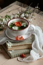 Pring floral herbal mint tea with flower buds of apple tree and quince flowers , vintage retro composition