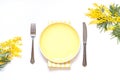 Spring floral table settings with spring flowers. Top view empty plate. Flat lay card. Royalty Free Stock Photo