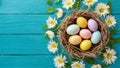 Spring flower table background with happy Easter eggs nest