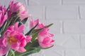 Spring flowers. Bouquet pink tulips on white wooden background Royalty Free Stock Photo