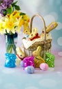 Easter still life with gold chocolate bunnies and decorations