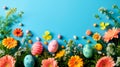 Spring flowers and colorful Easter eggs on pastel blue background with copy space above Royalty Free Stock Photo