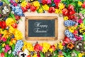 Spring flowers and easter eggs. Holidays background chalkboard Royalty Free Stock Photo