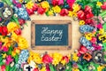 Spring flowers and easter eggs. Tulips, narcissus, hyacinth and Royalty Free Stock Photo