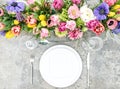 Spring flowers table place setting floral decoration Royalty Free Stock Photo