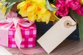 Spring flowers with gift box Royalty Free Stock Photo