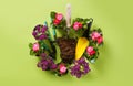 Spring flowers in pots, miniature garden tools and soil on the green background. Top view Royalty Free Stock Photo