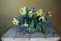 Spring flowers in a bouquet.Still life with tulips and daffodils in a vase Royalty Free Stock Photo