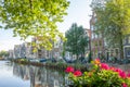 Spring Flowers and Sunny Day on the Amsterdam Canal Royalty Free Stock Photo