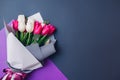 Spring flowers. Women`s day background. Bouquet of white and pink tulips. Present gift for Mother`s day. Space