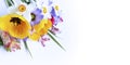 Spring flowers-yellow tulips, lilac chrysanthemums and white daffodils on a white background. Delicate flower arrangement.