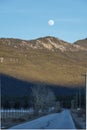 spring fool moon over mountains in british columbia canada Royalty Free Stock Photo