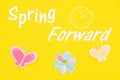 Spring Forward type message with a clock and butterflies and flower Royalty Free Stock Photo