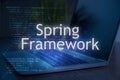 Spring framework inscription against laptop and code background